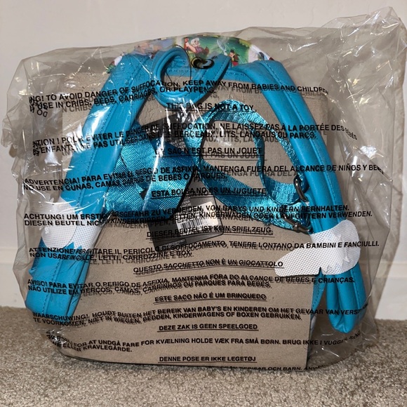 LOUNGEFLY DISNEY PINOCCHIO PAINTINGS AOP MINI BACKPACK~ WITH TAGS~ BRAND NEW~ - Picture 2 of 2